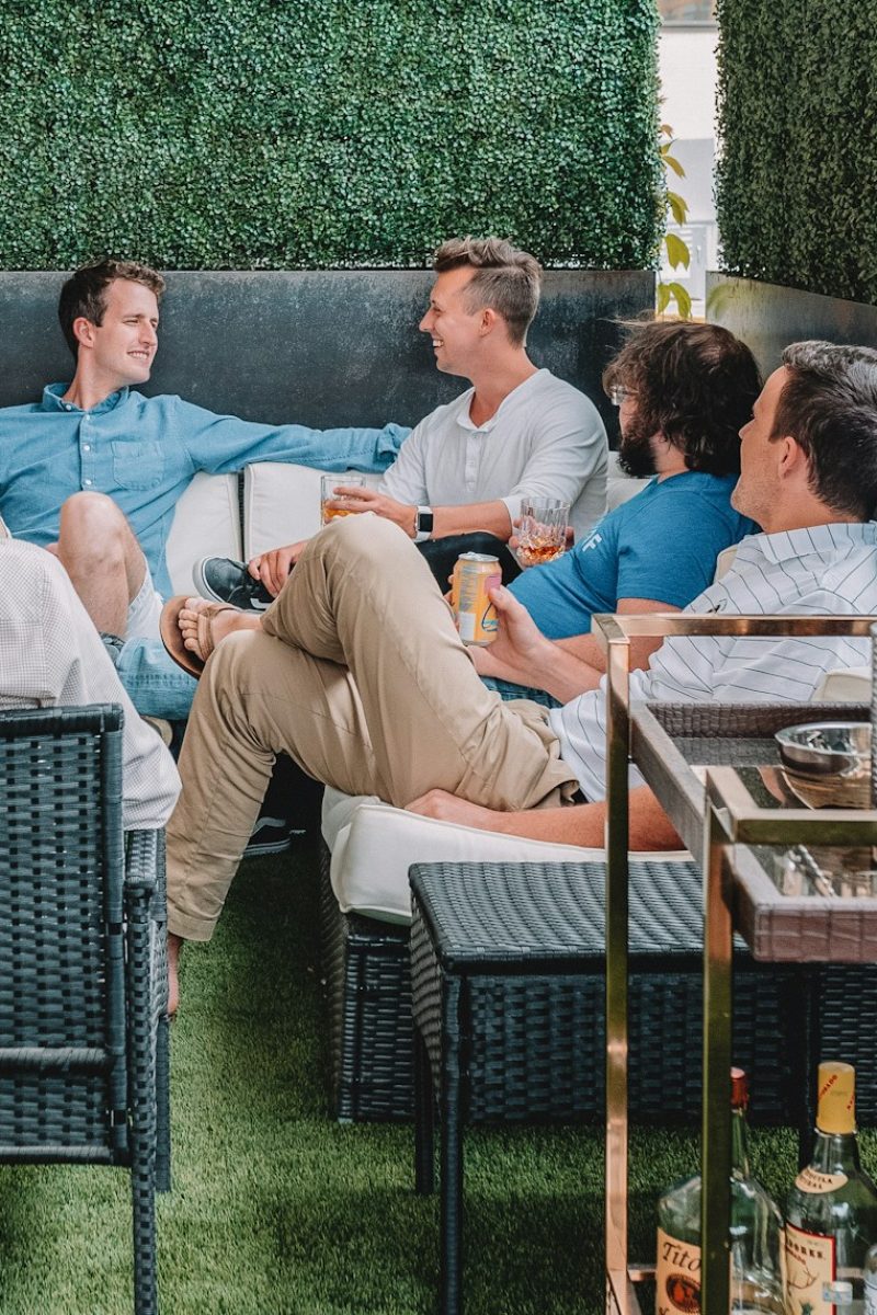 men sitting on chairs